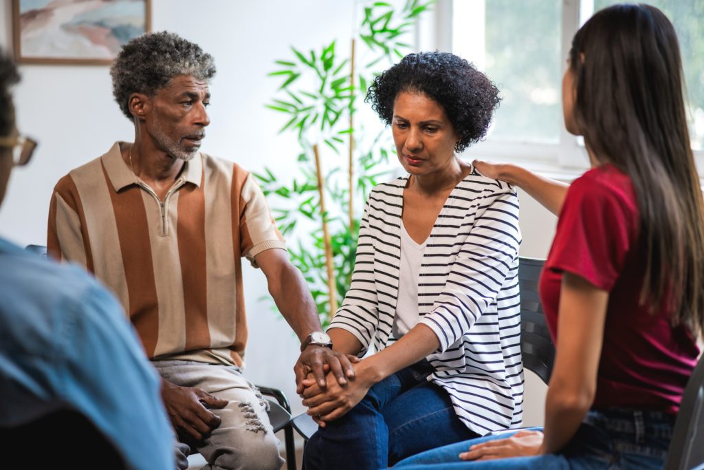 What role does therapy play in partial hospitalization programs?